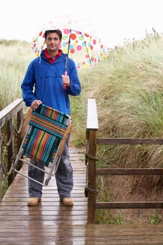 Young man with umbrella
