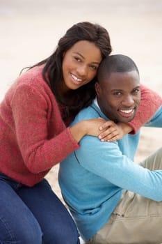 Young couple Embracing on beach