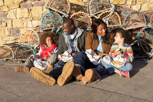 Happy family having picnic