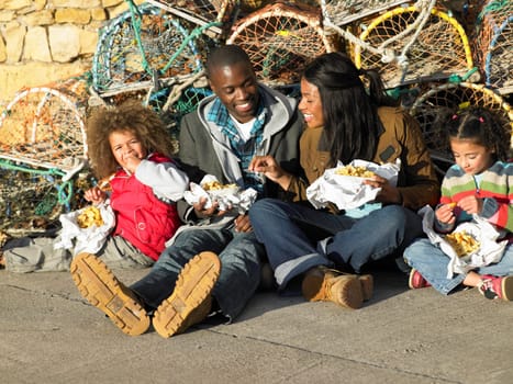 Happy family having picnic