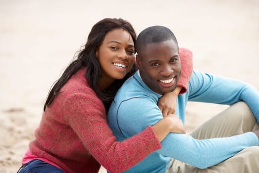 Young couple Embracing on beach