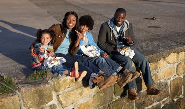 Happy family having picnic