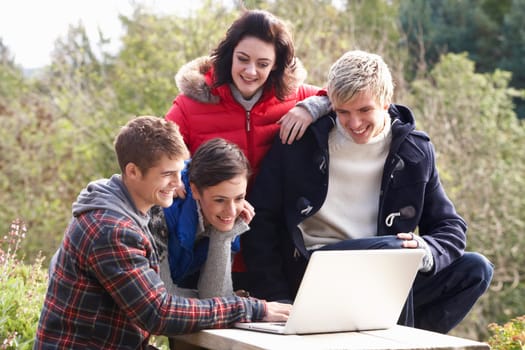 Students with laptop computer