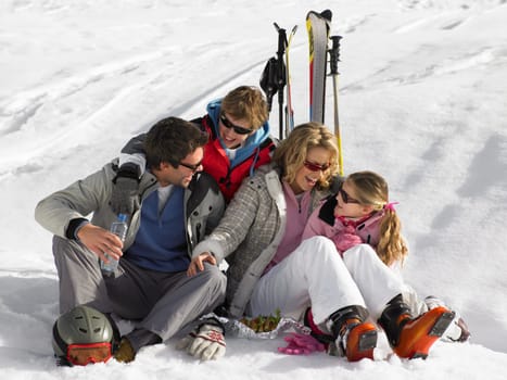 Young Family On Ski Vacation