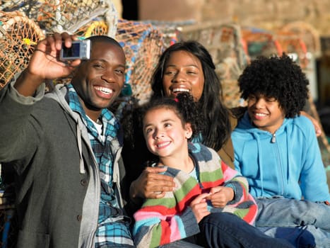 Happy family taking photo