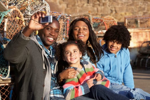 Happy family taking photo