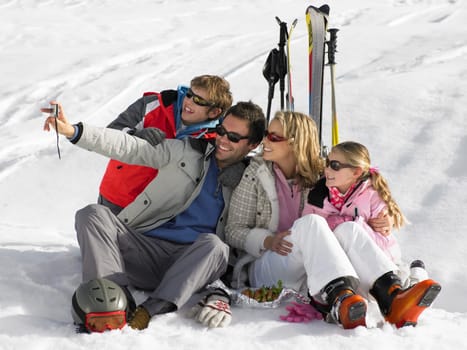 Young Family On Ski Vacation