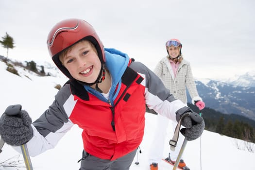 Young Mother And Son On Ski Vacation