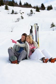 Young Couple On Ski Vacation