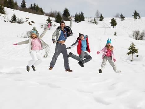 Young Family On Winter Vacation
