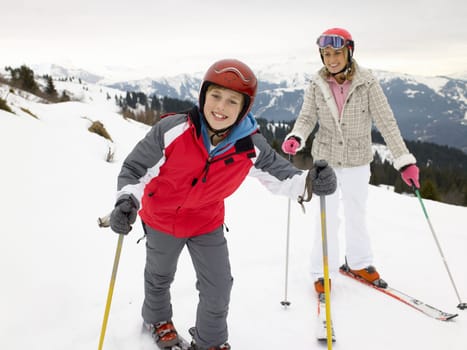 Young Mother And Son On Ski Vacation