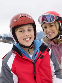 Young Mother And Son On Ski Vacation