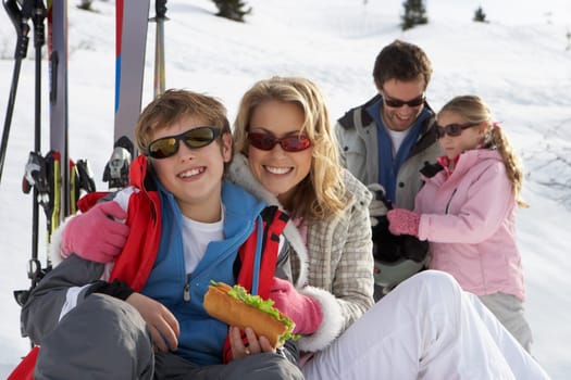 Young Family On Ski Vacation