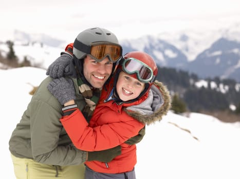 Young Father And Son On Winter Vacation