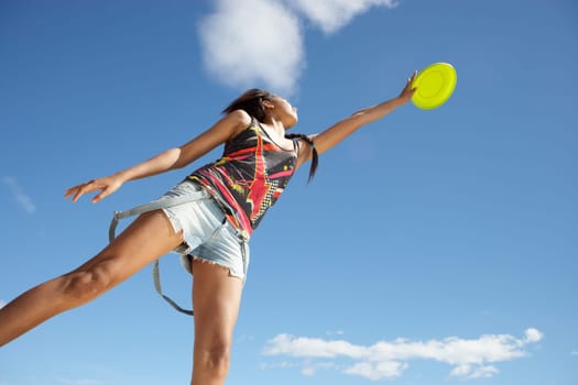 Teenage girl with frisbee