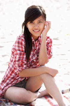 Portrait teenage girl on beach