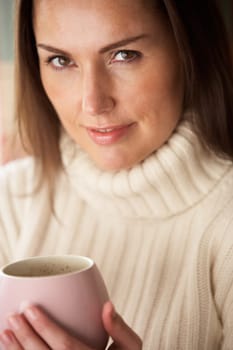 Woman with hot drink