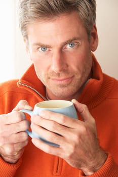 Man with hot drink
