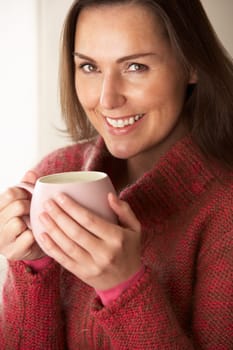 Woman with hot drink
