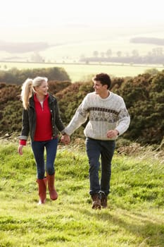Young couple on country walk