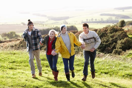 Young couples on country walk