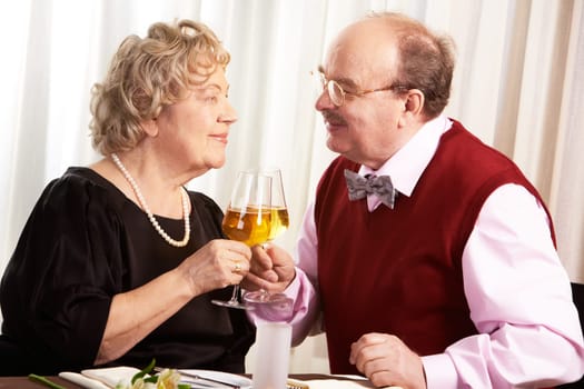Portrait of mature husband and wife celebrating their golden wedding