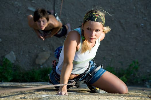 Woman and man engage in extreme sports