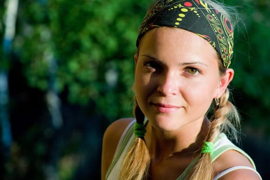 Image of tired sport woman touching her forehead