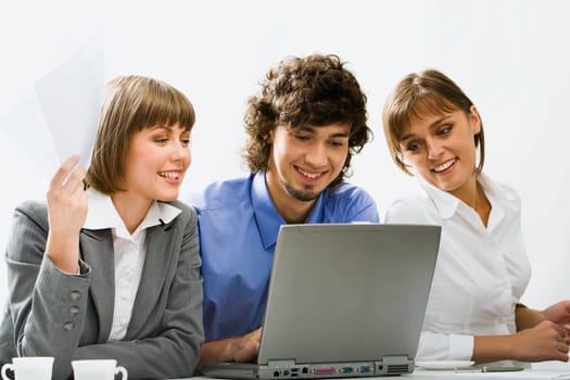 Successful business people are discussing a new project in the office