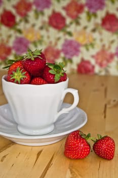 Strawberries in an old-fashioned cup