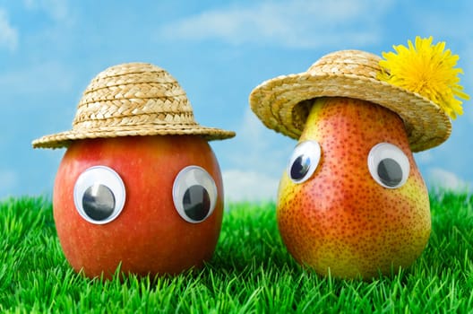 Apple and Pear with Face and Straw Hat