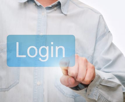 Man&#039 s Hand Pushing Login Button on Touch Screen