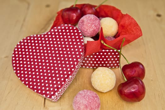 Truffles and cherries in heart box