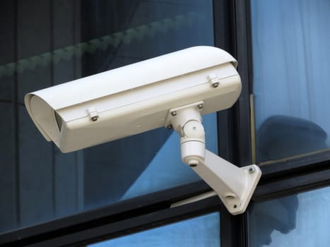 security camera attached on the office building