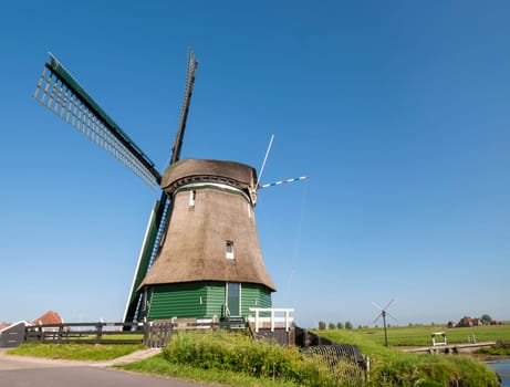 Katwoude windmill in Volendam, Holland, in a bright sunny day