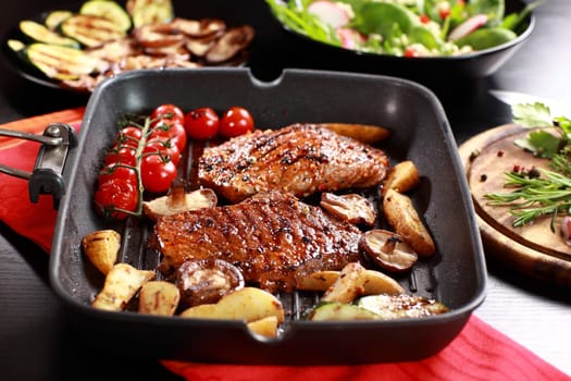 Delicious beef steak with grilled vegetable and mushrooms