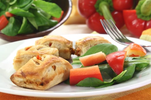 spicy puff pastry snacks with bell pepper and vegetable filling