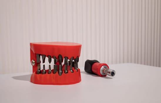 Denture Drill Bit Holder Set, Screwdriver Bit Organizing Holder Set On Table. Copy Space For Text, Horizontal Plane. High quality photo