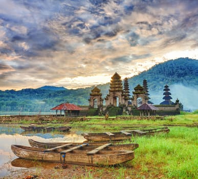 Temple Komala Tirta at sunrise time. Tamblingan lake. Bali