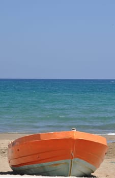 small boat on the beach