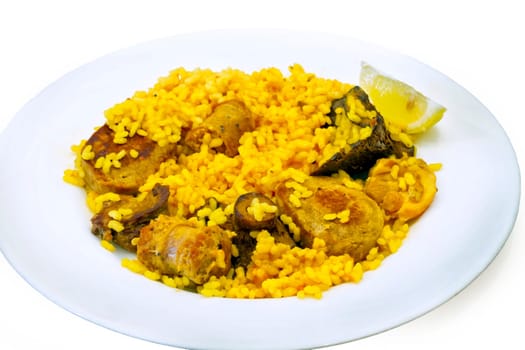 Valencian paella rice chicken and rabbit with mushrooms, typical of Spain