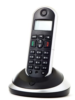 Wireless black telephone with cradle isolated on white background