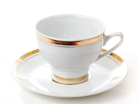 An classic empty porcelain cup for coffee or tea isolated on white background