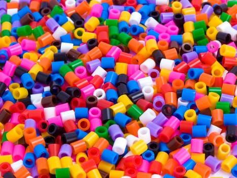 A lot of multicoloured beads, used as Background