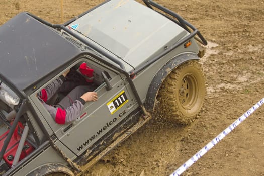 MOHELNICE, CZECH REPUBLIC - JUNE 10. Unidentified racer at off-road car leaves steep slope in the "SHOCK CUP Trial 2012"" on June 10, 2012 in the town of Mohelnice, Czech Republic."