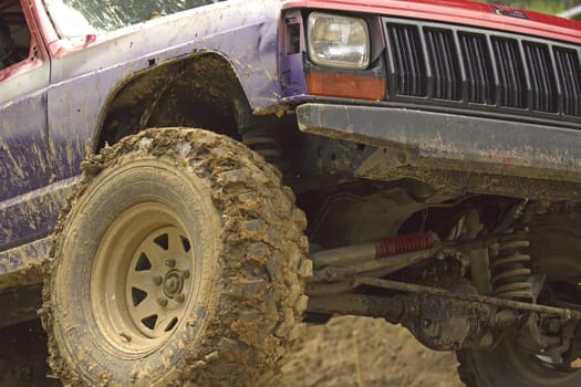 MOHELNICE, CZECH REPUBLIC - JUNE 10. Unidentified racer at off-road car leaves steep slope in the "SHOCK CUP Trial 2012"" on June 10, 2012 in the town of Mohelnice, Czech Republic."