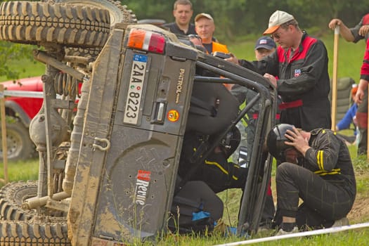 MOHELNICE, CZECH REPUBLIC - JUNE 10. Unidentified racer flipped his car on its side  in the "SHOCK CUP Trial 2012"" on June 10, 2012 in the town of Mohelnice, Czech Republic."