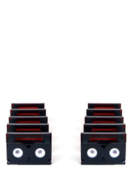 Mini DV magnetic tapes in a row, isolated on white background