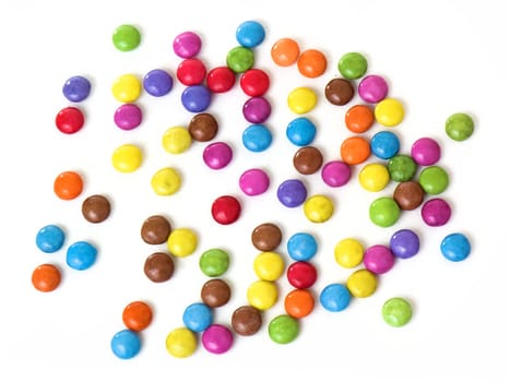 A lot of colorful sweets isolated on white background
