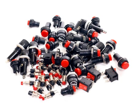 Switches, buttons, fuses, electronic components, on white background